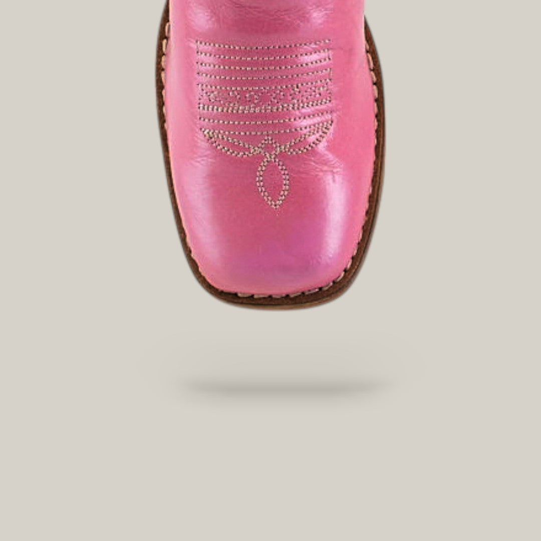 The Amara Pink - Square Toe - Kids Boots feature pink leather, white decorative toe stitching, and are shown from above on a light gray background.