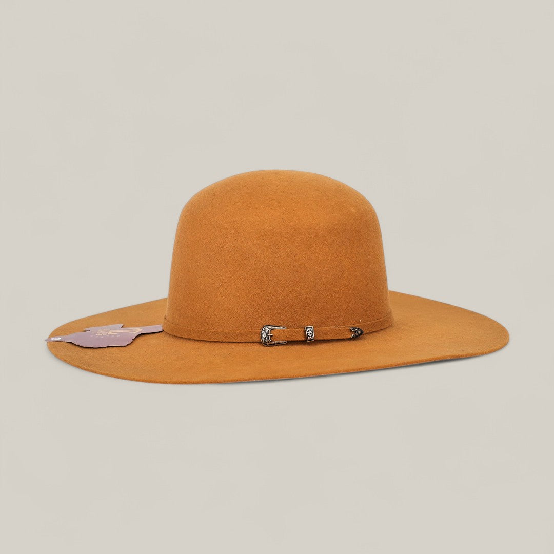 The 4X Caramel - TC Hats is a wide-brimmed, camel-colored Open Crown Texana Western hat featuring a decorative band with a metal buckle, shown against a plain light background.