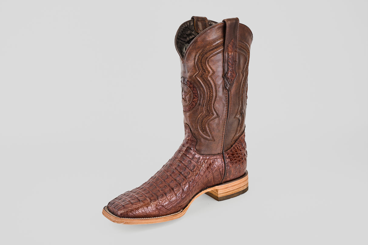 The Exotic Caiman Horn Back - Brown - Square Toe boot features textured caiman leather with a smooth upper, decorative stitching, and a light wooden heel, shown against a plain gray background.