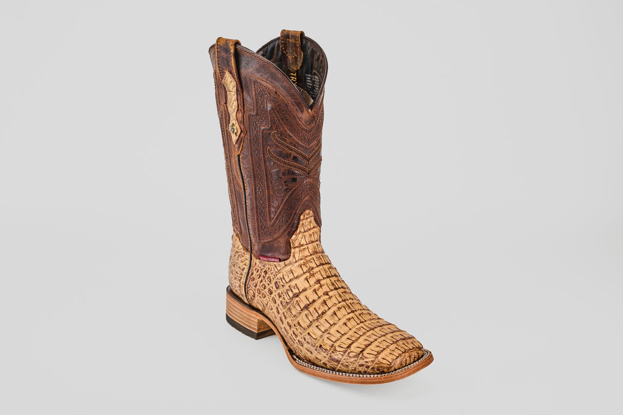 The Exotic Caiman Horn Back - Antique - Square Toe boot features a textured tan lower, a dark brown, intricately stitched upper, and classic Western styling, reminiscent of traditional exotic caiman boots on a light gray background.