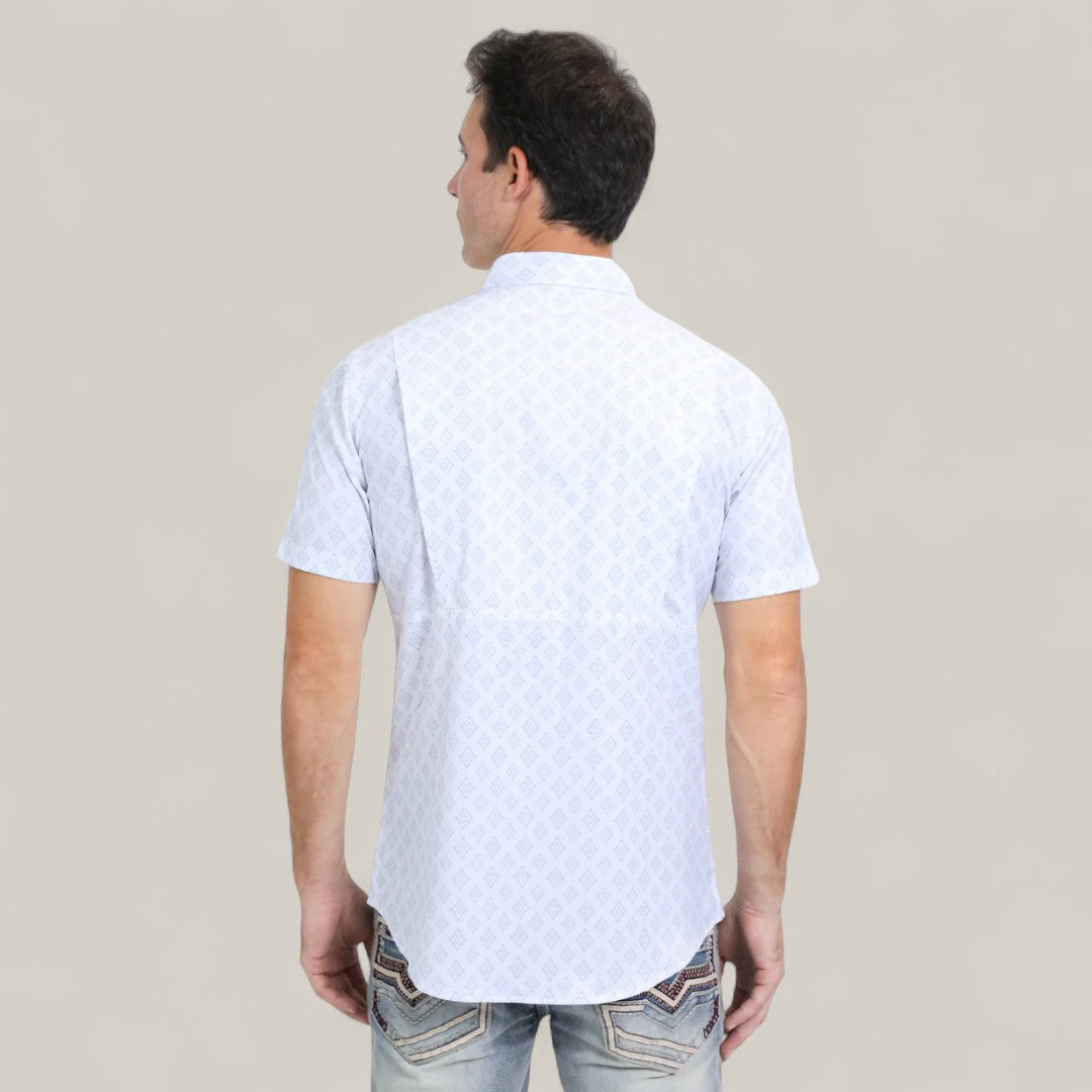 A man with short dark hair, wearing the Mens Performance Western Short Sleeve Aztec Print White Shirt - PGW10631 and faded jeans, stands with his back to the camera against a plain light background.