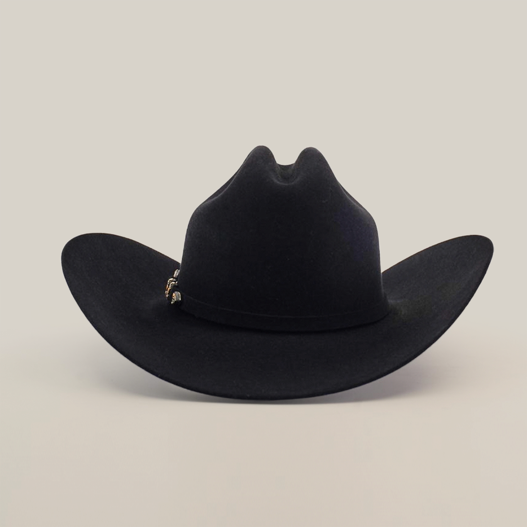 The 5X Dorado Black is a Western cowboy hat crafted from wild rabbit and beaver fur felt, featuring a wide brim and decorative band. Displayed against a plain white backdrop, it’s manufactured by Milano Hat Co. and exudes classic charm.