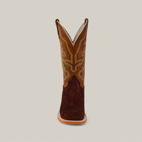 Front view of a Brown Suede - Platinum boot, featuring a square toe, crafted with rich brown leather and detailed stitching on the shaft against a plain grey background.
