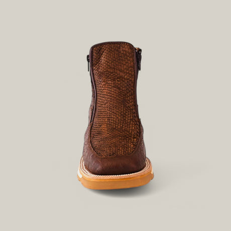 A single Exotic Python - Brown - Ankle Boot is showcased against a plain background, featuring brown leather with a textured finish, a light tan sole, and visible stitching around the heel and sole. The image emphasizes the stylish back view of this chic footwear.