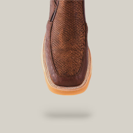 The Exotic Python - Brown - Ankle Boot features a textured leather design with a light-colored sole, displayed top-down on a soft gray background. Its ideal for those who value style and sophistication in each step.