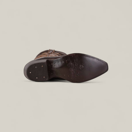 The Rush - Brown - Snip Toe cowboy boot in Rustico Café is displayed sole-up, showing stitching, nails, and Malboro branding on the bottom against a plain light background.