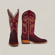 A pair of Exotic Python - Cherry Nobuck Square Toe boots with intricate yellow and white stitching, textured leather foot, and tan wooden heels, displayed on a light beige background.