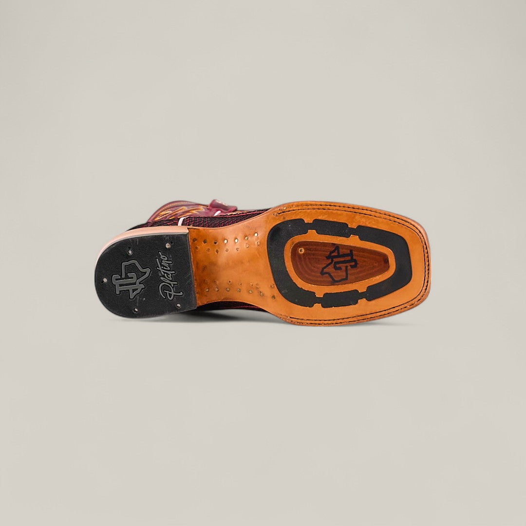 The image displays the sole of the Exotic Python - Cherry Nobuck - Square Toe, featuring a leather base with decorative design, black rubber heel with branding, visible stitching, embossed logo, and signature detailing.