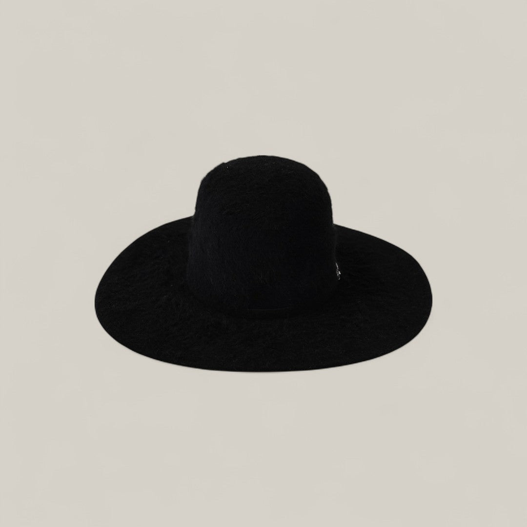 The 25X Grizzly - Black - TC Hat features a wide brim and rounded crown in luxury style, displayed against a plain light beige background.