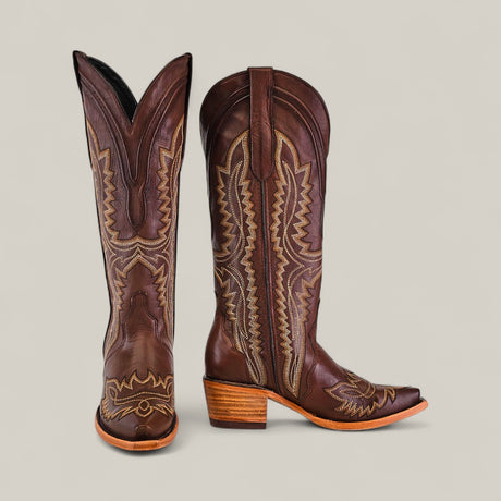 The Susan Brown - Tall Shaft - Snip Toe boots showcase brown leather, light-colored stitching, a medium wooden heel, and a tall shaft design for women, displayed against a plain light background.
