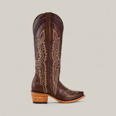 The Susan Brown - Tall Shaft - Snip Toe is a single brown leather boot with decorative stitching, a pointed snip toe, and a stacked wooden heel, shown against a plain light background.