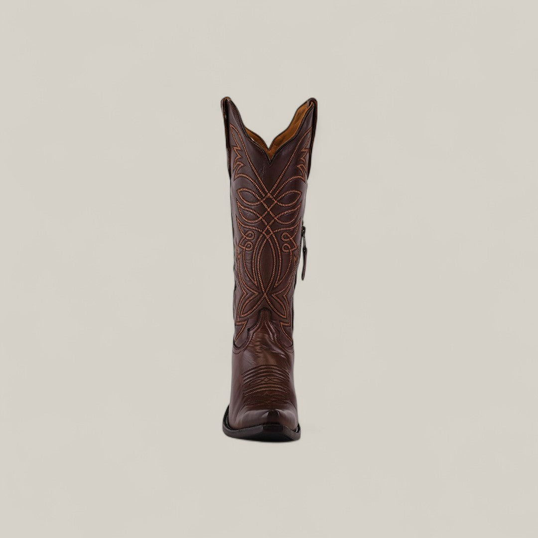 The Kellie Clayton Caramel Leather Sole boot features a tall shaft, snip toe, and decorative stitching, shown upright against a light beige background—perfect for stylish womens boot enthusiasts.
