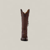 The Kellie Clayton Caramel Leather Sole boot features a tall shaft, snip toe, and decorative stitching, shown upright against a light beige background—perfect for stylish womens boot enthusiasts.