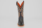 The Steele - Black - Square Toe boot features textured leather, a black square toe, intricate orange and grey stitching, and a brown sole, presented front view against a light gray background—ideal for luxury footwear seekers.
