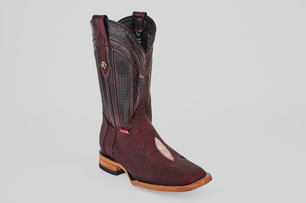 The Ranger – Wine – Square Toe boot features maroon stingray leather, decorative shaft stitching, a square toe, tan sole, and low wooden heel, shown on a light gray background—ideal for those seeking distinctive ranger boots.