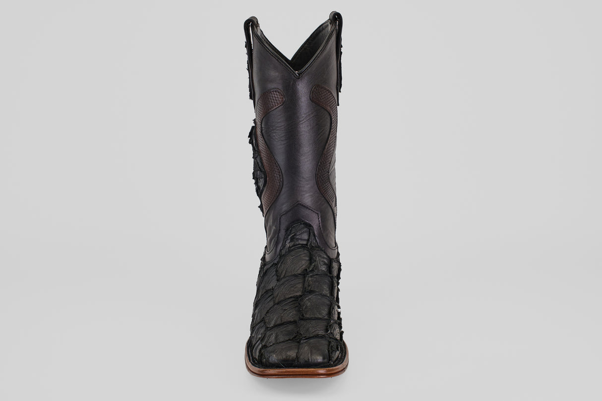 A single Conor Platinum - Matte Black - Square Toe (Diamond) boot, crafted from textured pirarucu leather with detailed stitching, is shown from the front against a plain light background.