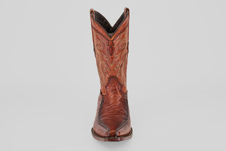 The Lizard Cogñac – Embossed Leather - Versy Toe (E201) boot, shown from the front on a plain light background, features decorative stitching and highlights classic western style.