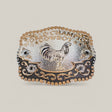 The Square Champion Rooster Buckle features a gold rooster at its center, surrounded by ornate western designs. World Champion Cowboy is engraved at the top, with intricate gold and alpaca silver detailing throughout.