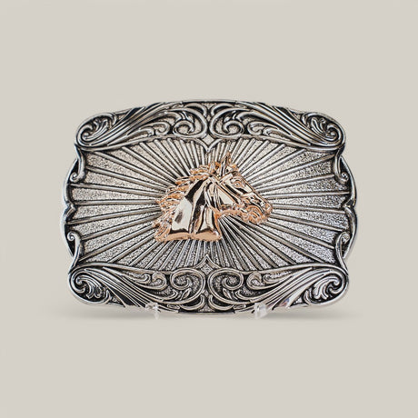 The Square Gold Rose Horse Buckle showcases an embossed horse head at its center with ornate swirling western designs and a radiating background, crafted from alpaca silver to exude rugged elegance in Texas-style.