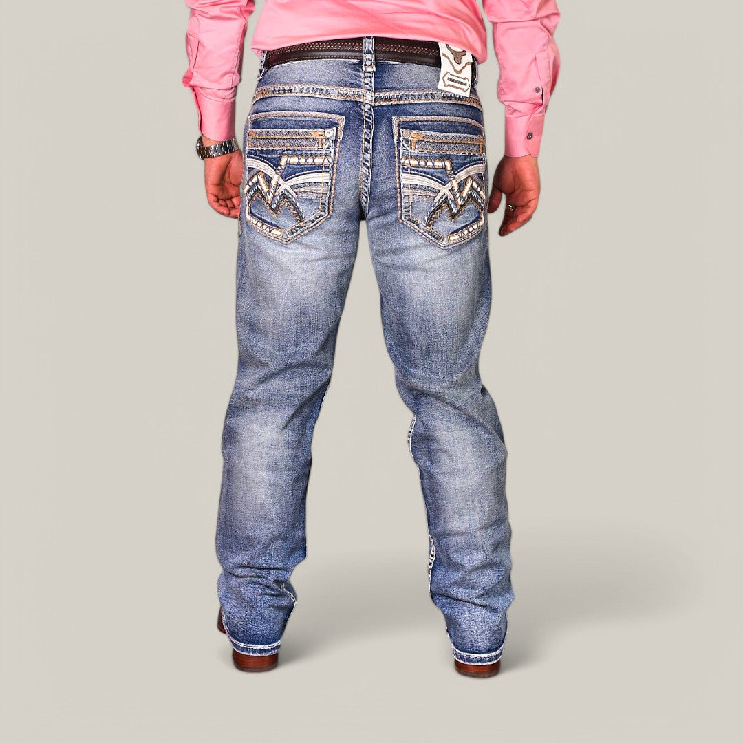 A person wearing a pink shirt, Western Blue Straight Fit Embroidered Jeans WJ-2347, a studded belt, and brown cowboy boots stands with their back to the camera against a plain background.
