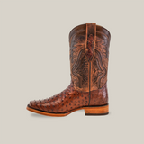 The Exotic Ostrich - Brown - Rodeo Toe is a brown cowboy boot with superior craftsmanship, featuring decorative stitching on the shaft and a rugged ostrich leather surface. It includes a wooden sole and pull strap, elegantly displayed against a plain white background.